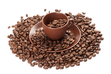 Coffee cup and beans on a white background
