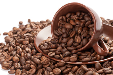Coffee cup and beans on a white background