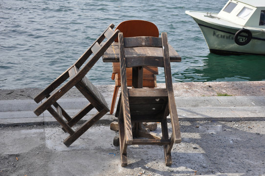 wooden furniture by the sea