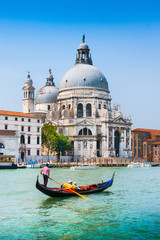 Fototapeta na wymiar Traditional Gondola on Canal Grande in Venice, Italy
