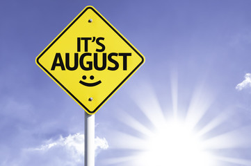It's August road sign with sun background
