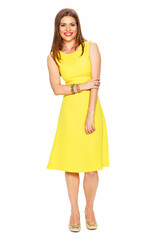 Ellow dress. White background. Young woman fashion style portra