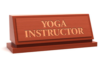 Obraz premium Yoga instructor job title on nameplate