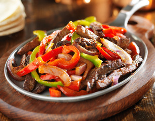 mexican food - beef fajitas and bell peppers