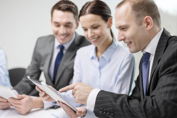 business team with tablet pc having discussion