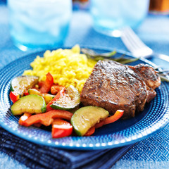 steak with vegetables and rice dinner