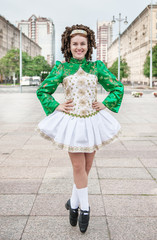 Young woman in irish dance dress posing