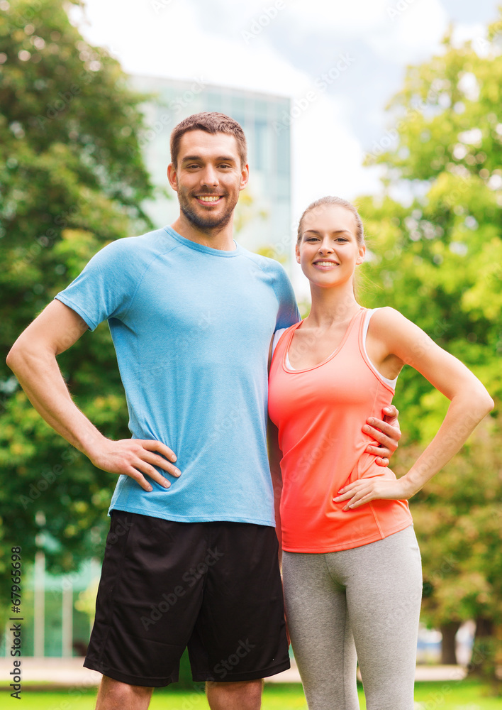 Wall mural smiling couple outdoors