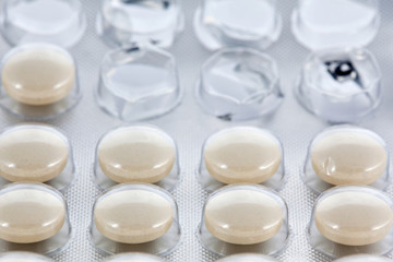 Round pills in blister pack
