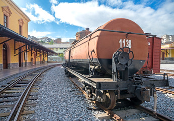 Fototapeta na wymiar Back view of a gas wagon of an old train