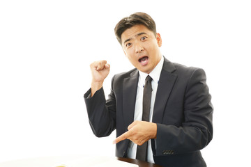 ガッツポーズのビジネスマン