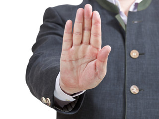 Obraz premium stop sign by one palm - businessman hand gesture