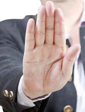 stop sign by one palm - businessman hand gesture
