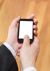 mobile phone cut out screen in businessman hands