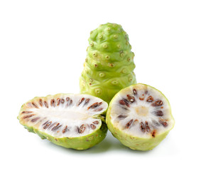 Noni Indian Mulberry fruit on white background