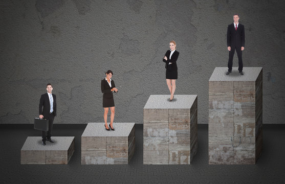 Business People Standing On Bar Graph