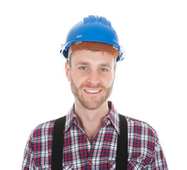 Manual Worker Standing With Hands On Hip