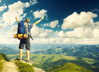 Tourist in mountains. Sport and active life concept