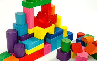 Fototapeta premium Tower of wooden colorful toy blocks