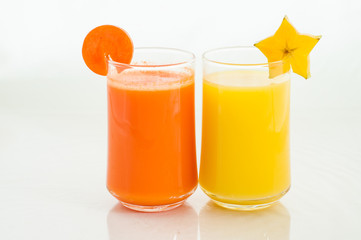 Fruit and vegetable juice on white