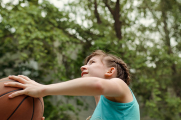 Girl about to shoot basketball