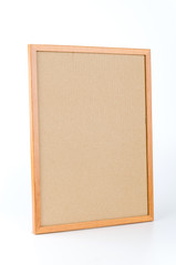Naklejka premium Cork board isolated white background