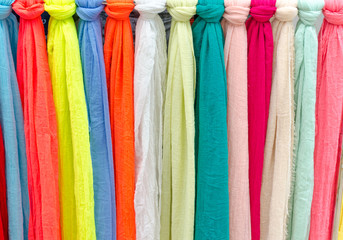 Colorful scarves at a market in Italy. Colors of textiles