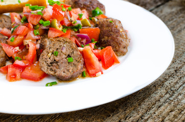 Meatballs with spicy tomato salsa