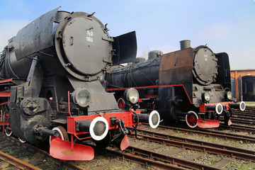 Fototapeta na wymiar Picture of the black antique locomotives