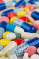 Color pills and capsules background