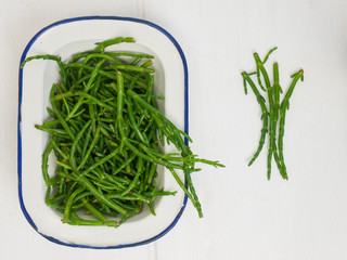 rock samphire on a white table