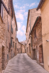 ancient alley in Volterra, Tuscany, Italy