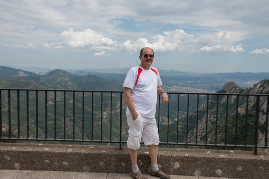 Mature man on  Llobregat valley background, Montserrat, Cataloni