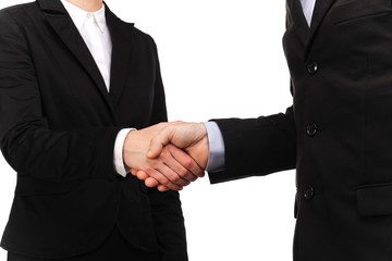 handshake between a businessman and a businesswoman