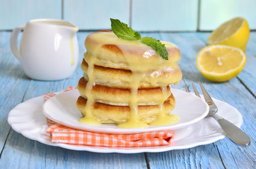 Pancakes with lemon sauce.