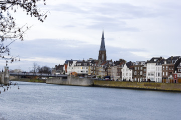 Fototapeta premium Panorama of Maastricht, Netherlands in cloudy calm winter day