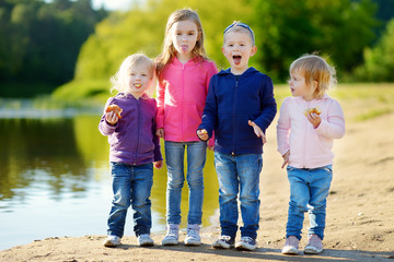 Three sisters and their brother having fun