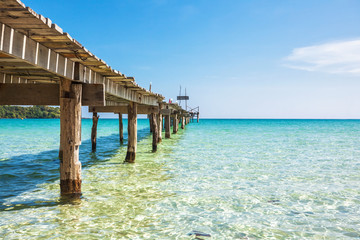 Old wooden pier in the sea