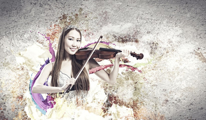 Obraz na płótnie Canvas Woman violinist
