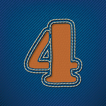 Number 4 made from leather on jeans background