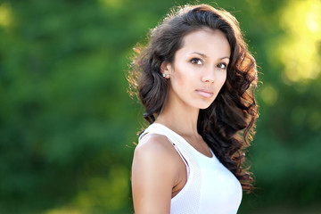 portrait of a beautiful brunette in a sporting manner