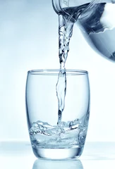 Selbstklebende Fototapeten glass of water © Mara Zemgaliete