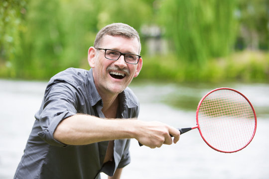 Man Playing Badminton