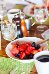 Breakfast with fresh fruits and coffee