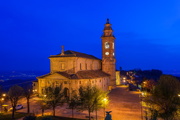 Fototapeta na wymiar Catholic church illuminated at night.