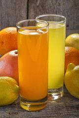 Orange juice and lemonade with orange, lemon and grapefruit
