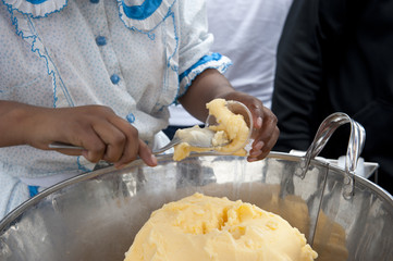 Getting ice cream ready on a sunny day.