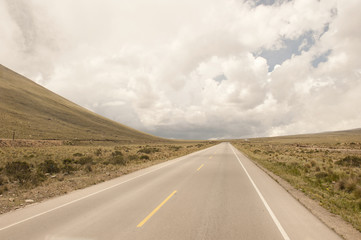 A Peruvian roadway near Arequipa Peru in the Yura district on a cloudy day.
