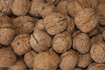 Heap of walnuts on table top