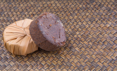 Palm sap sugar on a wicker background 